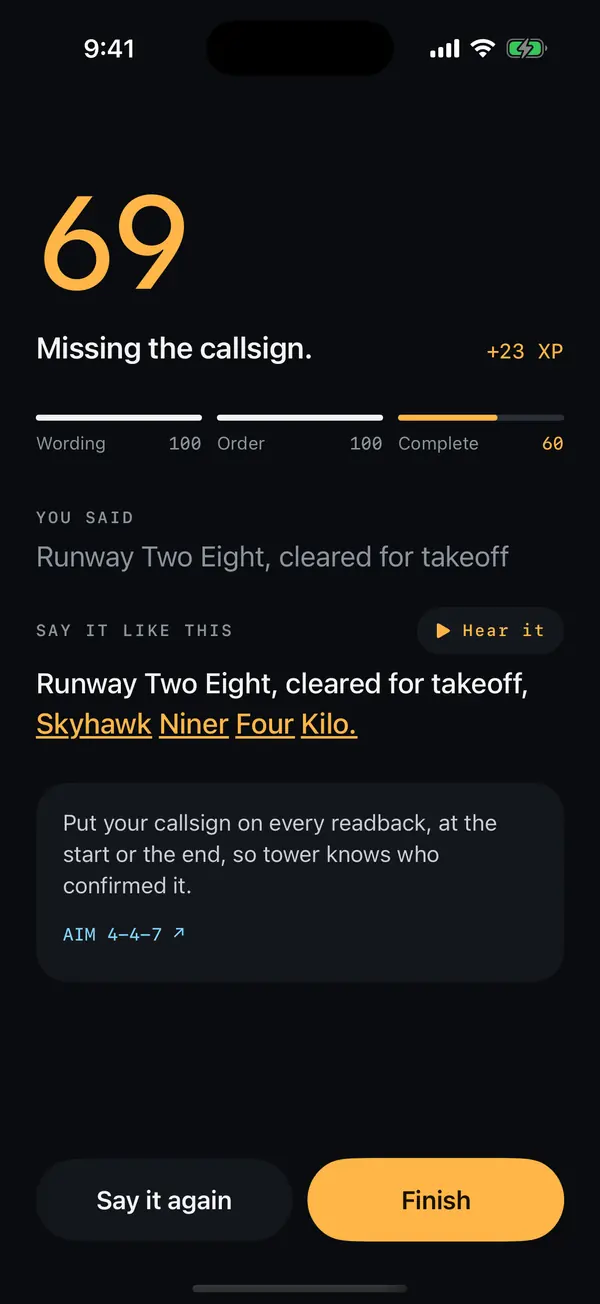 The debrief: a score of 69, missing the callsign, with what to say and the AIM paragraph it comes from.